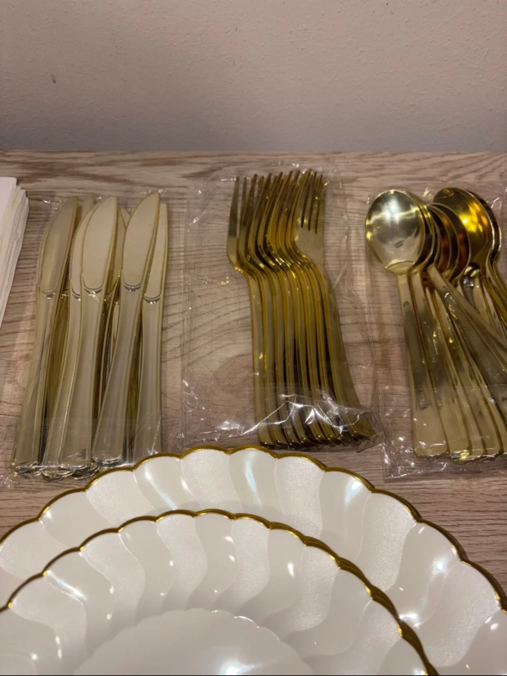 Elegant White and Gold Scalloped Paper Plates with Matching Cutlery and Napkins